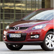 Бампер передний в цвет кузова Mazda CX7 (2006-)